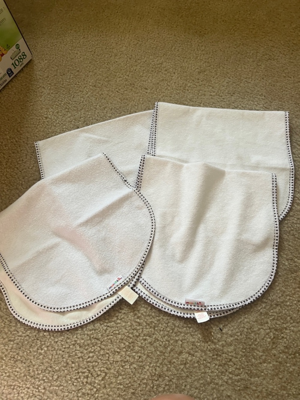 Munchkin White Bibs with Navy Dot Trim - Pack of 4